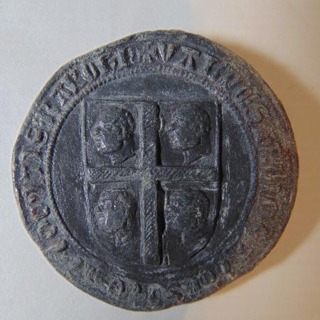 Reverso bula de plomo de Jaime II de Aragón